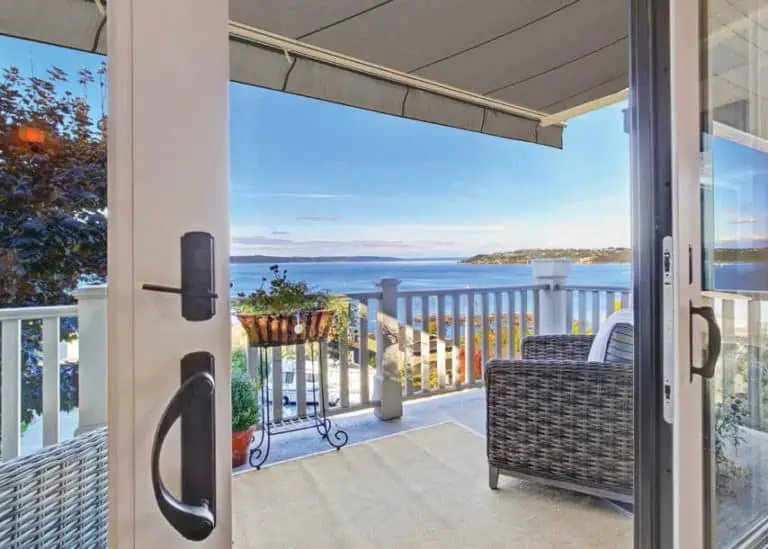 SummerSpace Pro Series cassette awning extended over a waterfront deck